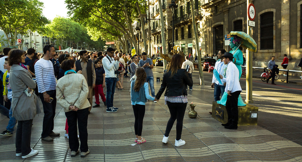 Lady in Cyan and tourist crowd on Las Ramblas, Barcelona