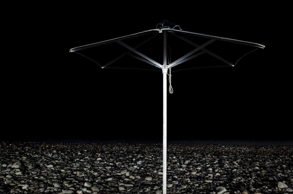 Beach umbrella at night