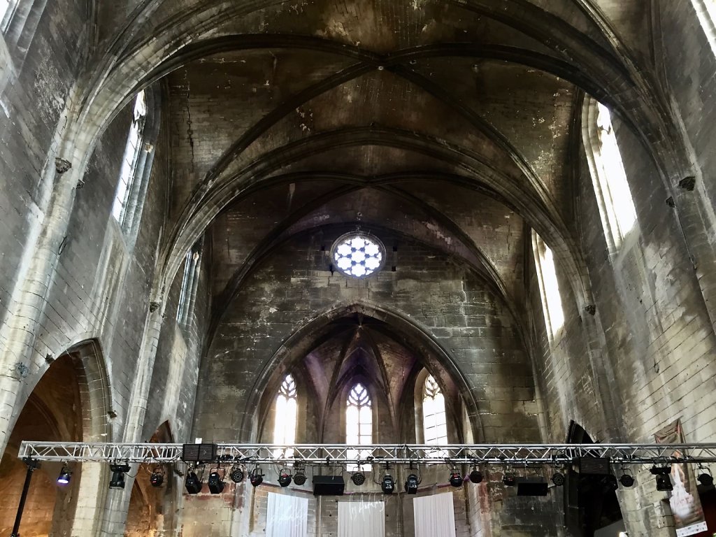 Church interior with blackened ceiling, Arles